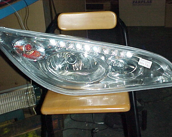 CONJUNTO FARO GLOLEDBUS 2006-3B IZQUIE.